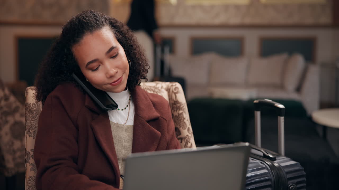 Businesswoman Working in Hotel Lobby