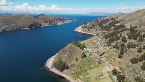 aerial: la ciudad de san pablo de tiquina en la orilla del lago titicaca en bolivia