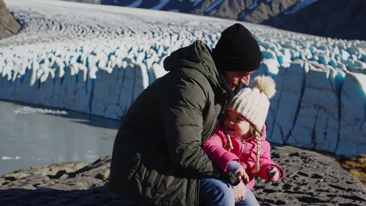 Father and Daughter Enjoying Glacier Views