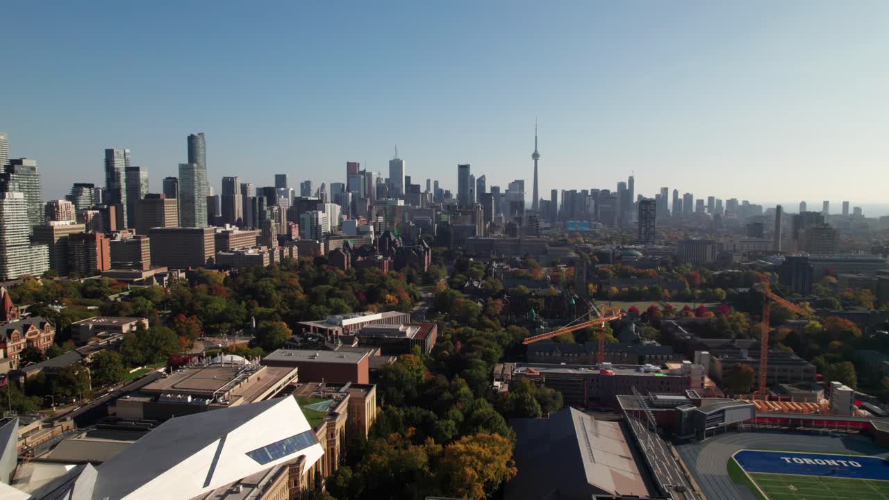 Hazy aerial of Toronto skyline in autumn, 4K drone shot