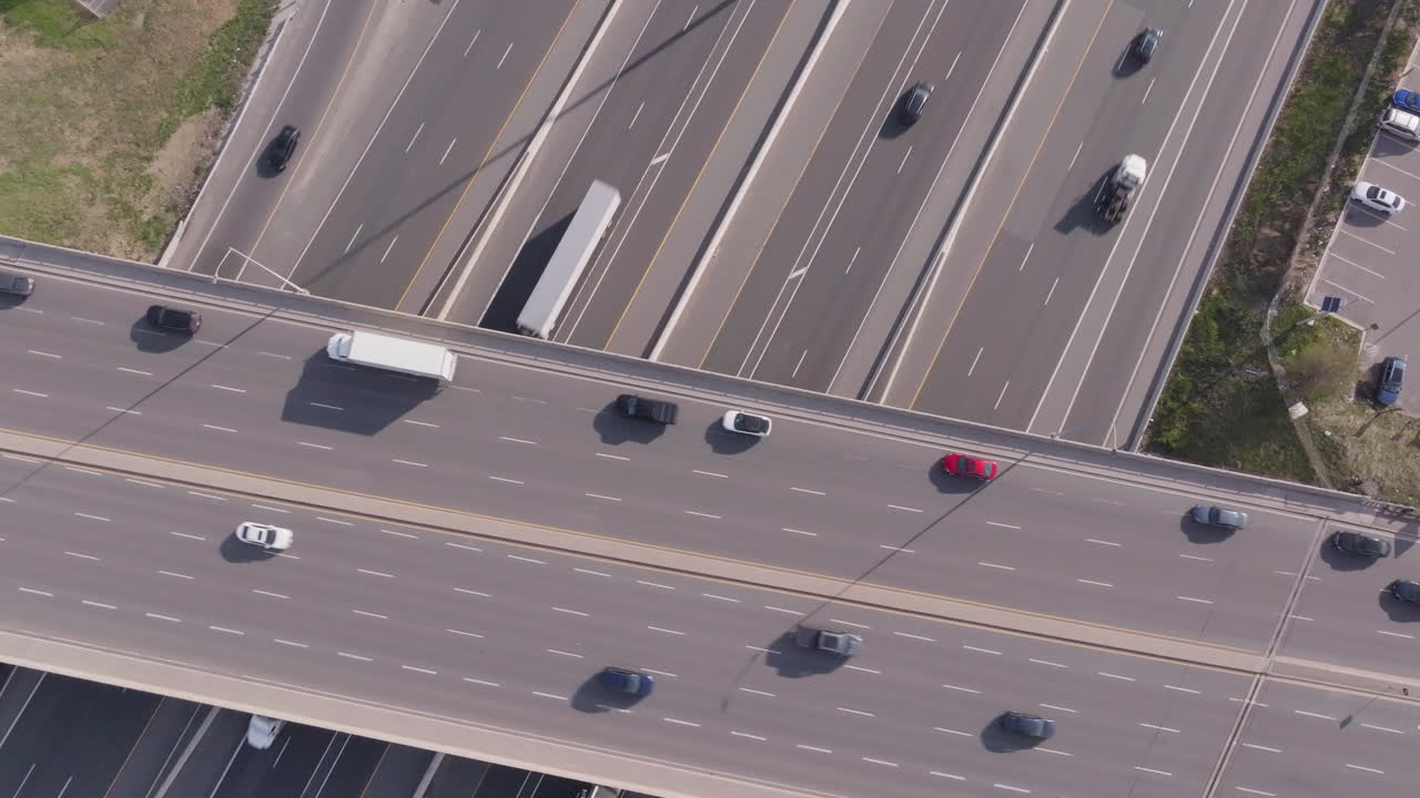 Traffic on highway 401, mississauga, canada, with cars and trucks driving, aerial view