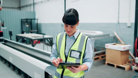 factory worker using tablet