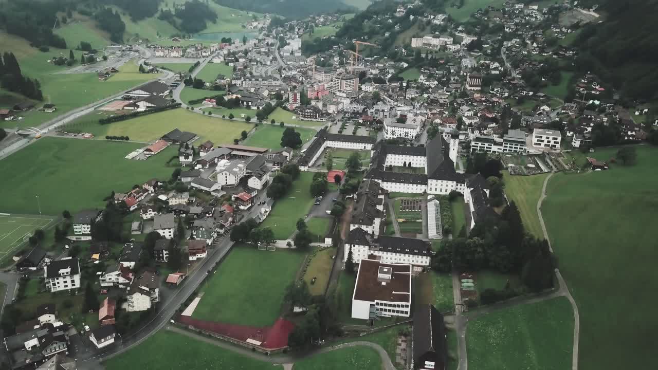 Drone aerial pan up over Endelberg in Switzerland showing the whole town and buildings