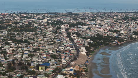 Aerial-over-the-fishing-village-of-Mũi-Né,-Phan-Thiet,-Vietnam