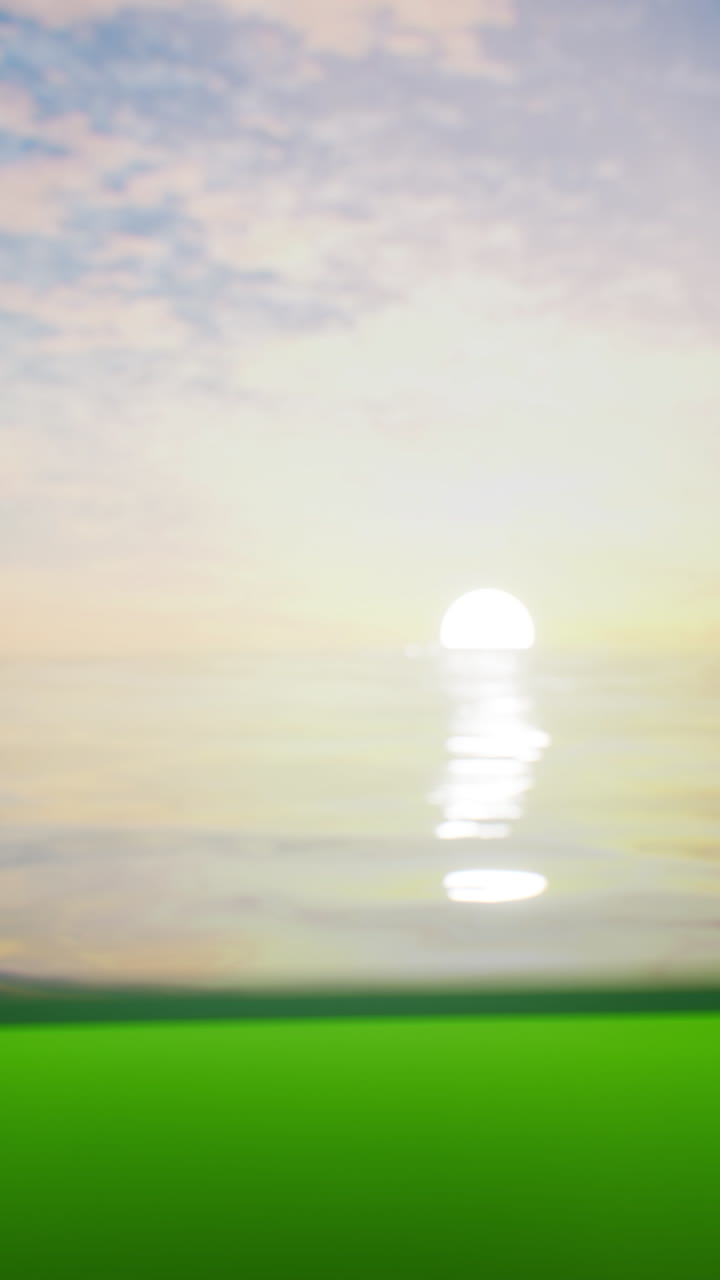 잔디과 바다 위에 해가 지는 것