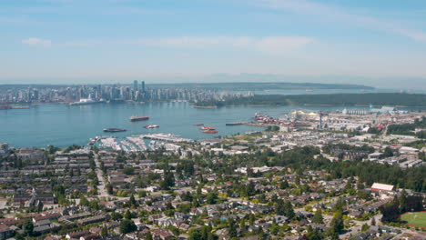 wide aerial view of vancouver harbour and the downtown skyline from central lonsdale