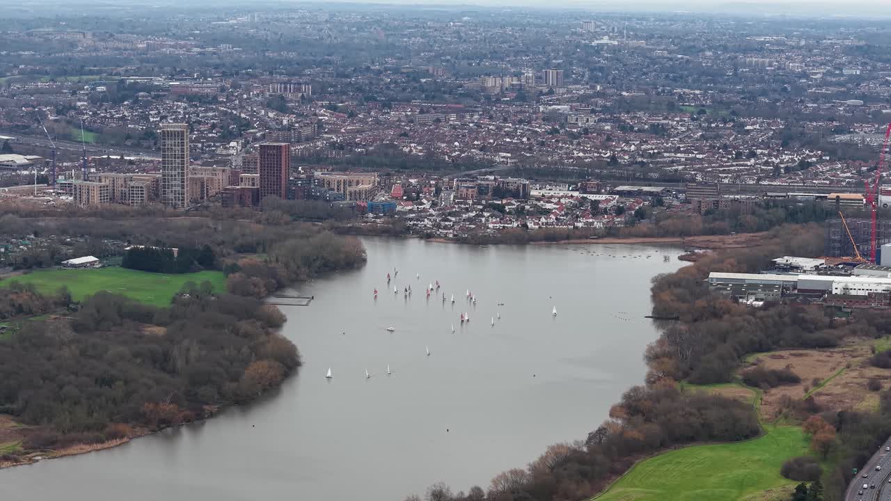 Boats Sailing At Brent Reservoir From Neasden Recreation Ground Park In London, England, UK. - aerial shot