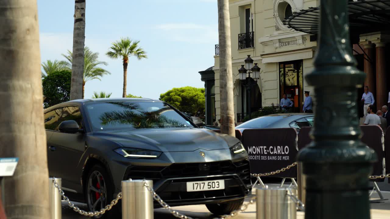 Luxury Lamborghini SUV parked outside the Monte Carlo Casino in Monaco