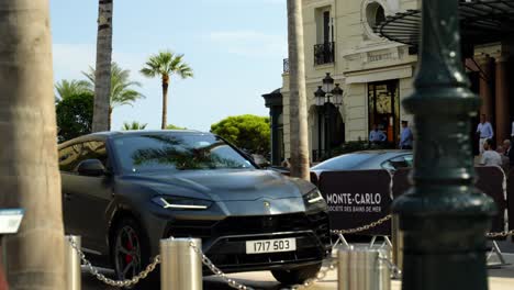 luxury lamborghini suv parked outside the monte carlo casino in monaco