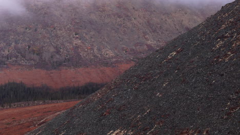 rugged mountains of ogilvie in yukon, canada - drone shot