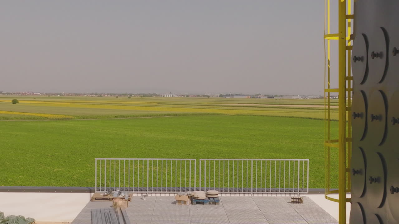 Industrial Facility with Agricultural Landscape View