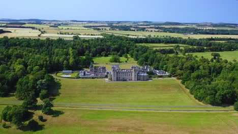 aerial view of famous castle in scottish borders, famous landmark in scottish countryside, scotland, united kingdom