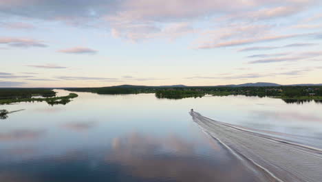 boat sailing on the calm lake with scenic