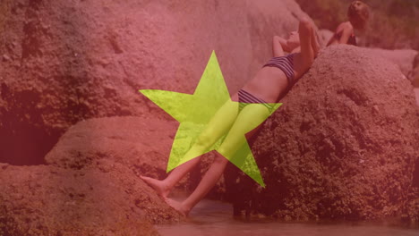 relaxing on rocky beach, person with large yellow star and animation overlay