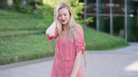 woman in red floral dress