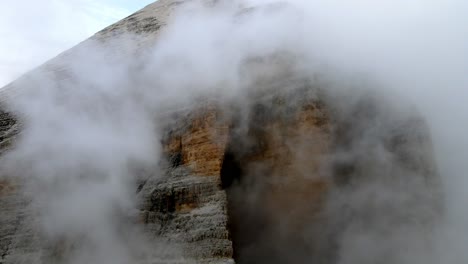 Aerial-views-of-italian-Dolomites-peaks-in-a-foggy-and-cloudy-day