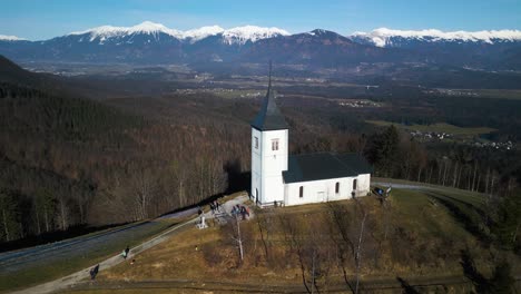 picturesque mountain chapel in julian alps near jamnik, slovenia