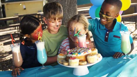 kids having sweet food and drinks in the playground 4k