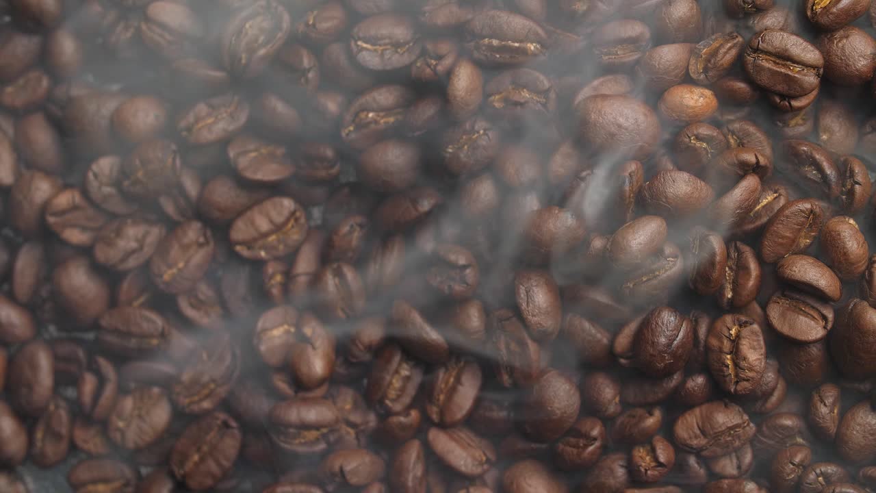 Top View Of Roasted Coffee Beans With Smoke, Video In 4K, 50Fps