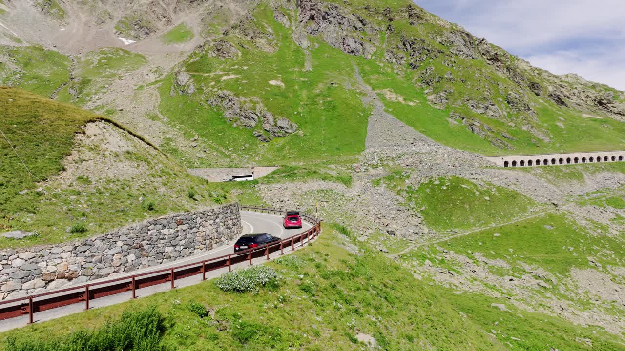 Scenic mountain road footage in Aosta Valley showing travel, freedom lifestyle
