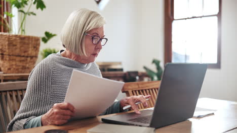 senior, woman and documents with laptop