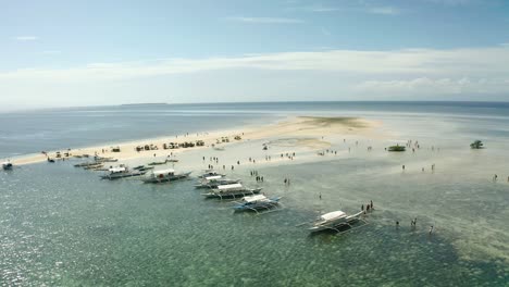Aerial-Of-Sea-Urchin-Fishermen-With-Banca-Boats-Moored-On-Sandbank-At-Bohol