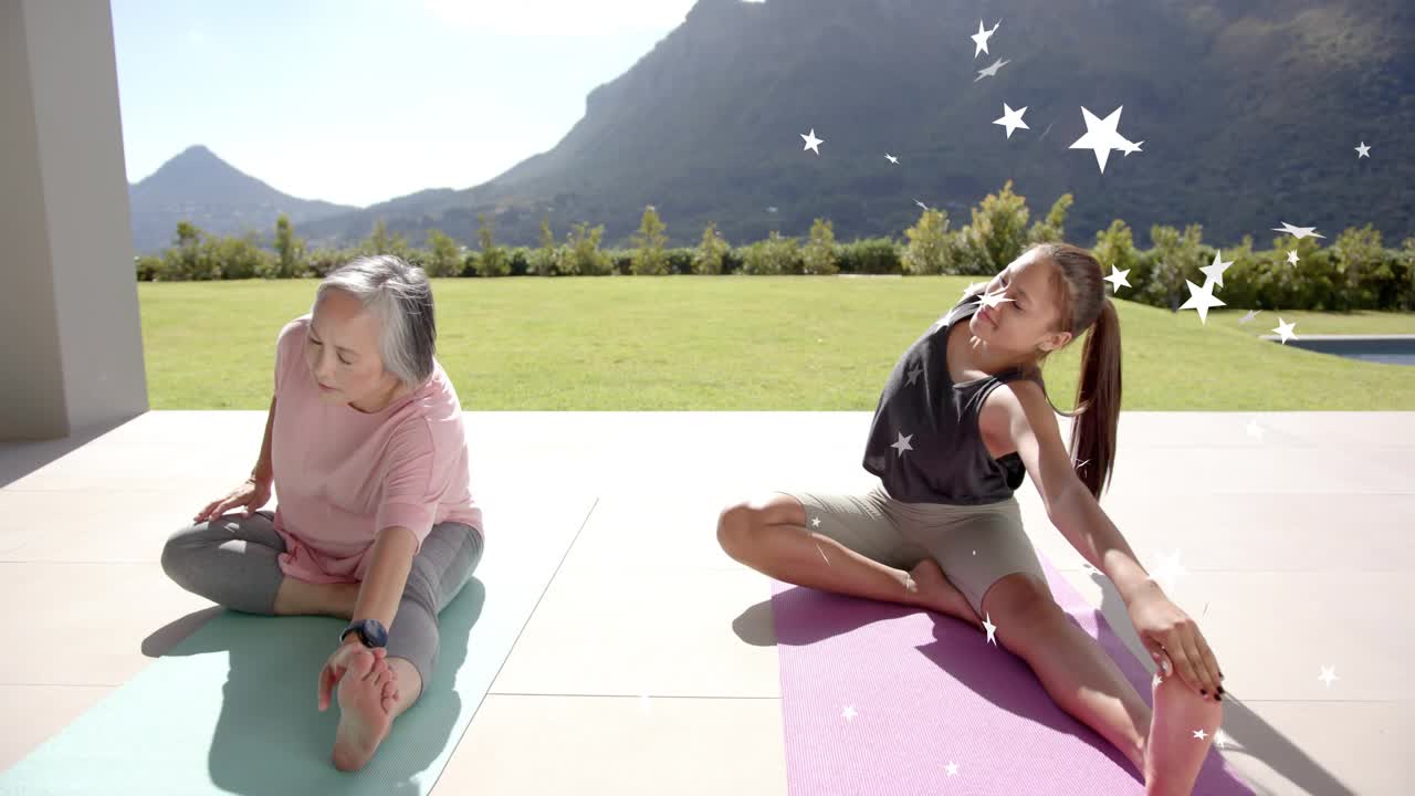 Teen starting side stretches while mom matching on mats, stars tracking motion for fitness