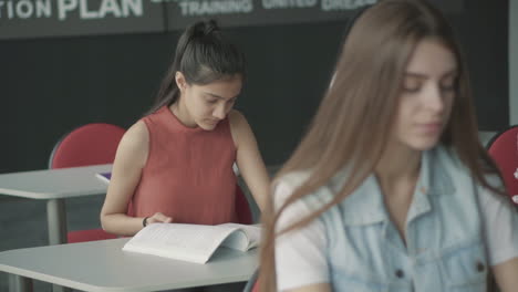 university girl studying in class