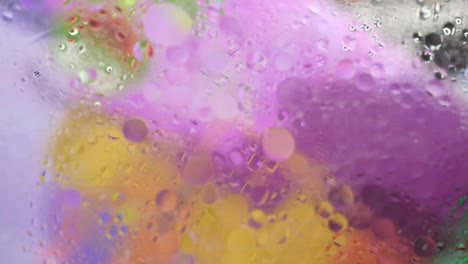 burbujas móviles de mezcla de aceite, agua y colores