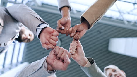 Fist-bump,-teamwork-or-hands-of-business-people