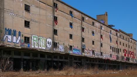 abandoned warehouses covered in graffiti in an industrial area of st louis missouri