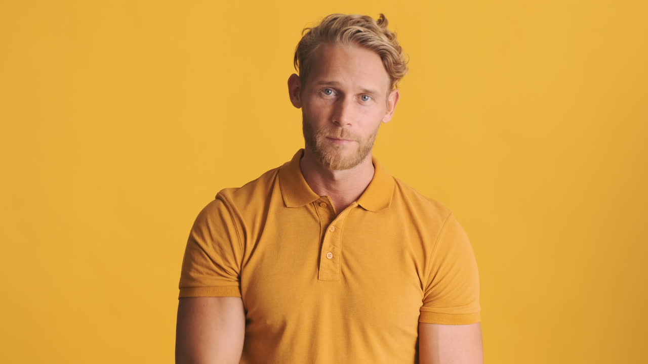 Bearded man doing call me sign