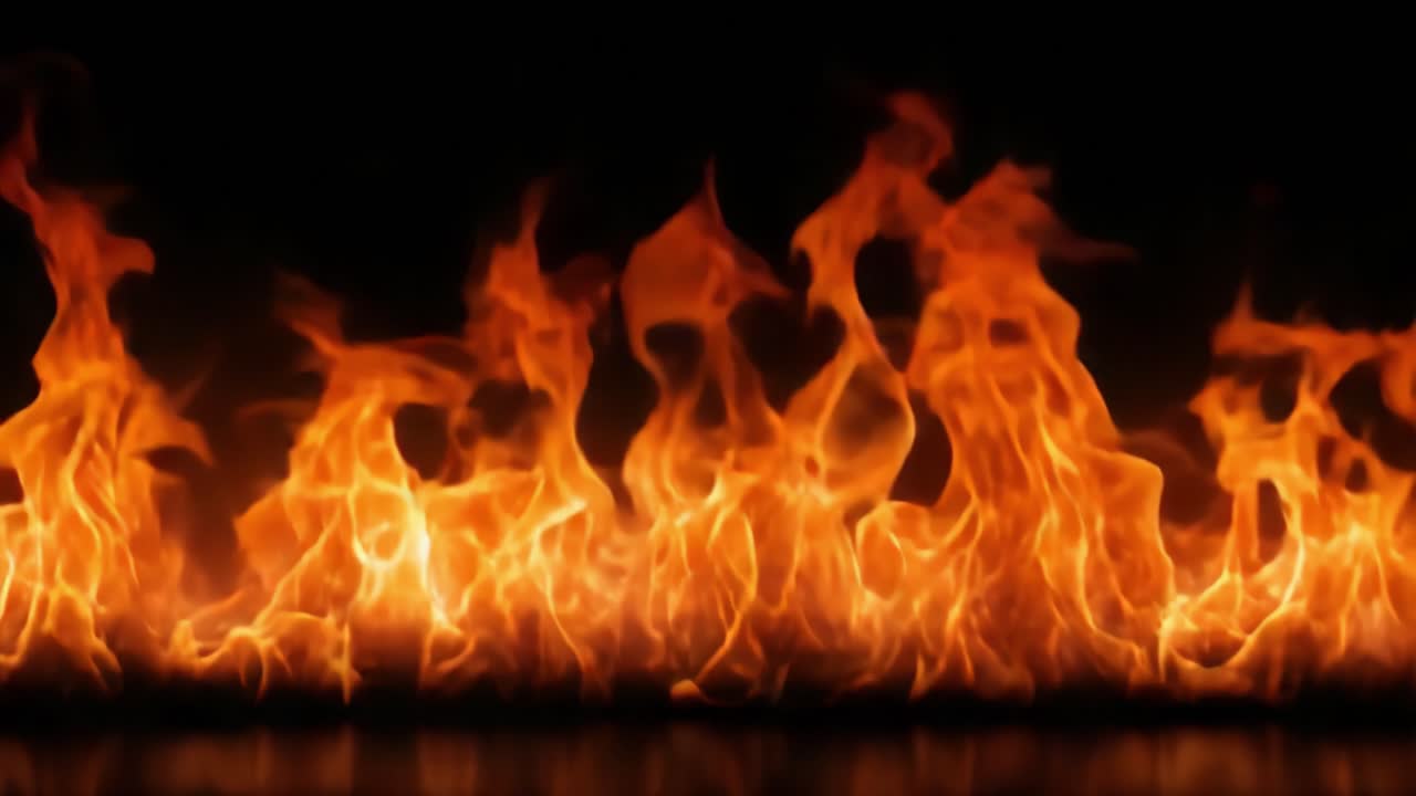 Captivating Flames: A Dynamic Display of Fire's Dance and Energy Against a Dark Background, Highlighting the Intricacies of the Element's Movement and Color Dynamics