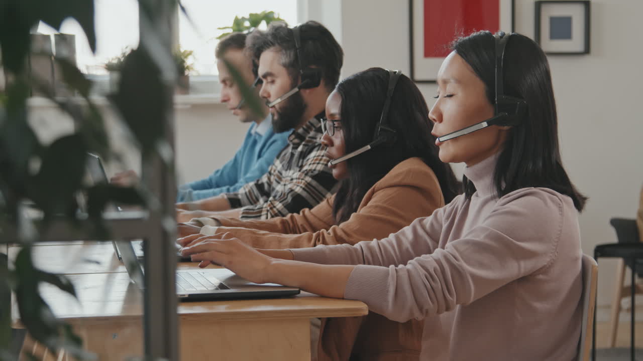 Call Center Workers Helping Customers