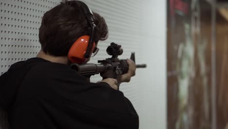 Man-Shooting-at-Firing-Range-in-protective-headphones