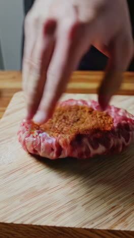 preparing a beef burger