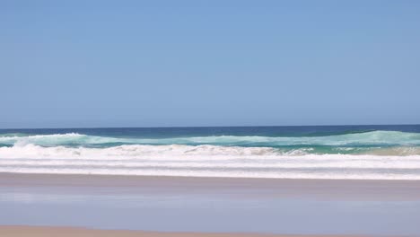 continuous ocean waves on a clear day