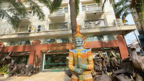 vibrant statues outside a bangkok building