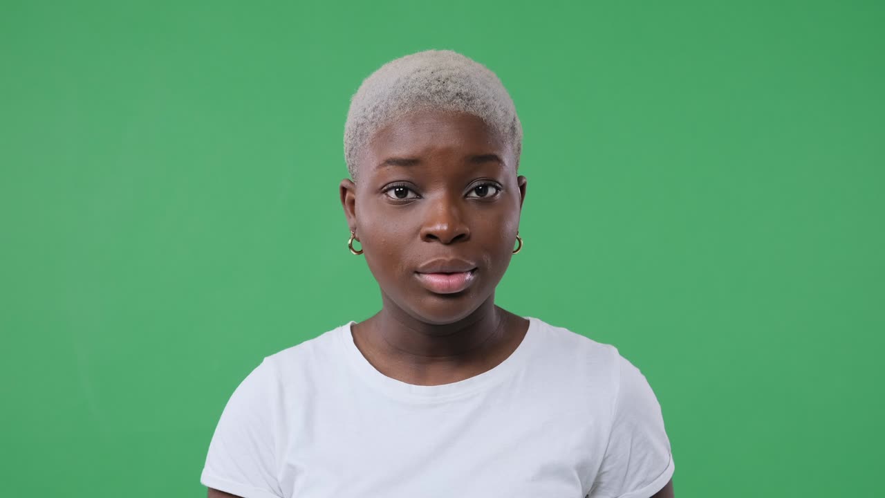 Woman saying no by shaking her head