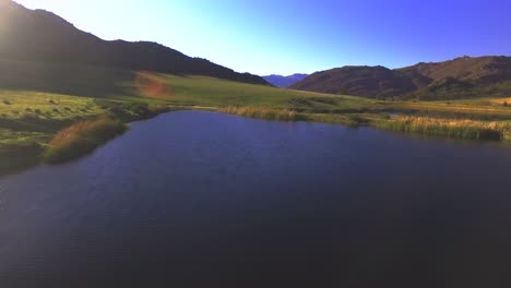 Aerial-of-lake-and-mountains