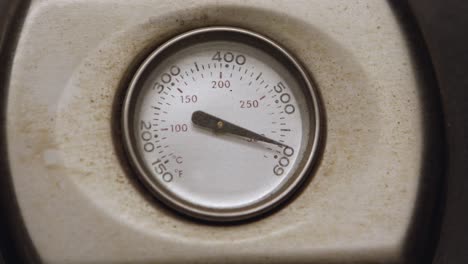 close up of a grill thermometer