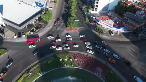 aerial view of the minerva roundabout, west to east, and the traffic with the vallarta avenue in guadalajara, jalisco, mexico