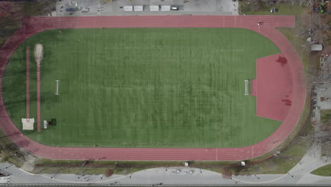 aerial birds eye view of astrofurf encircled by a quarter mile running track