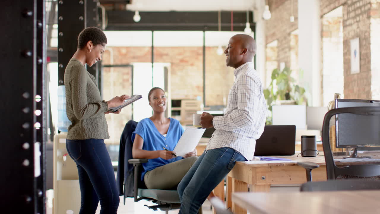 Diverse business professionals collaborate in a modern office