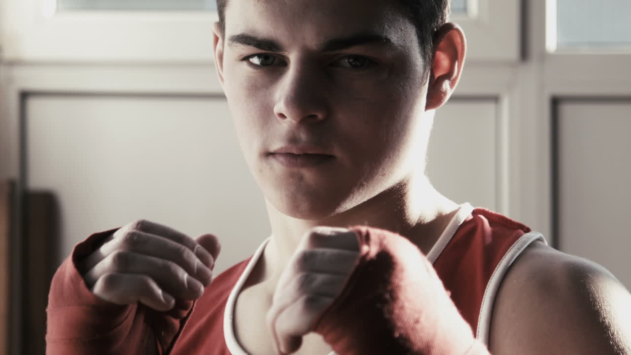 Portrait of successful young businessman looking into camera