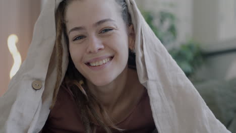 woman hiding and laughing