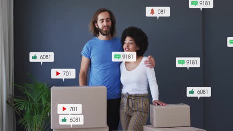 social media notifications animation over couple with moving boxes