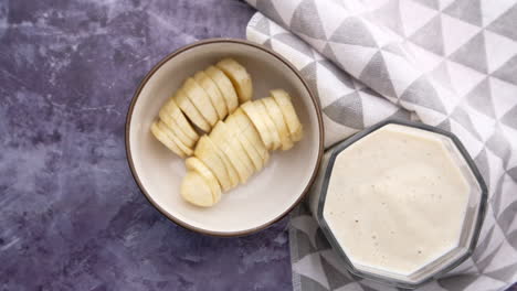 banana smoothie with banana slices