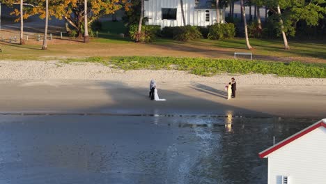 couple exchanging vows on a serene beach