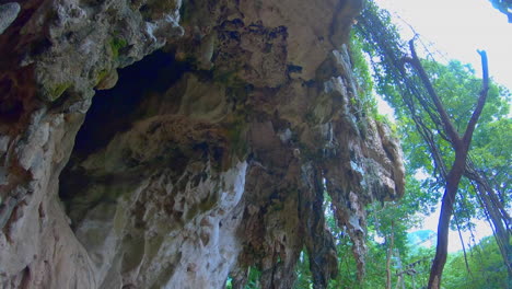 slow motion | pov of caves overhead in thailand